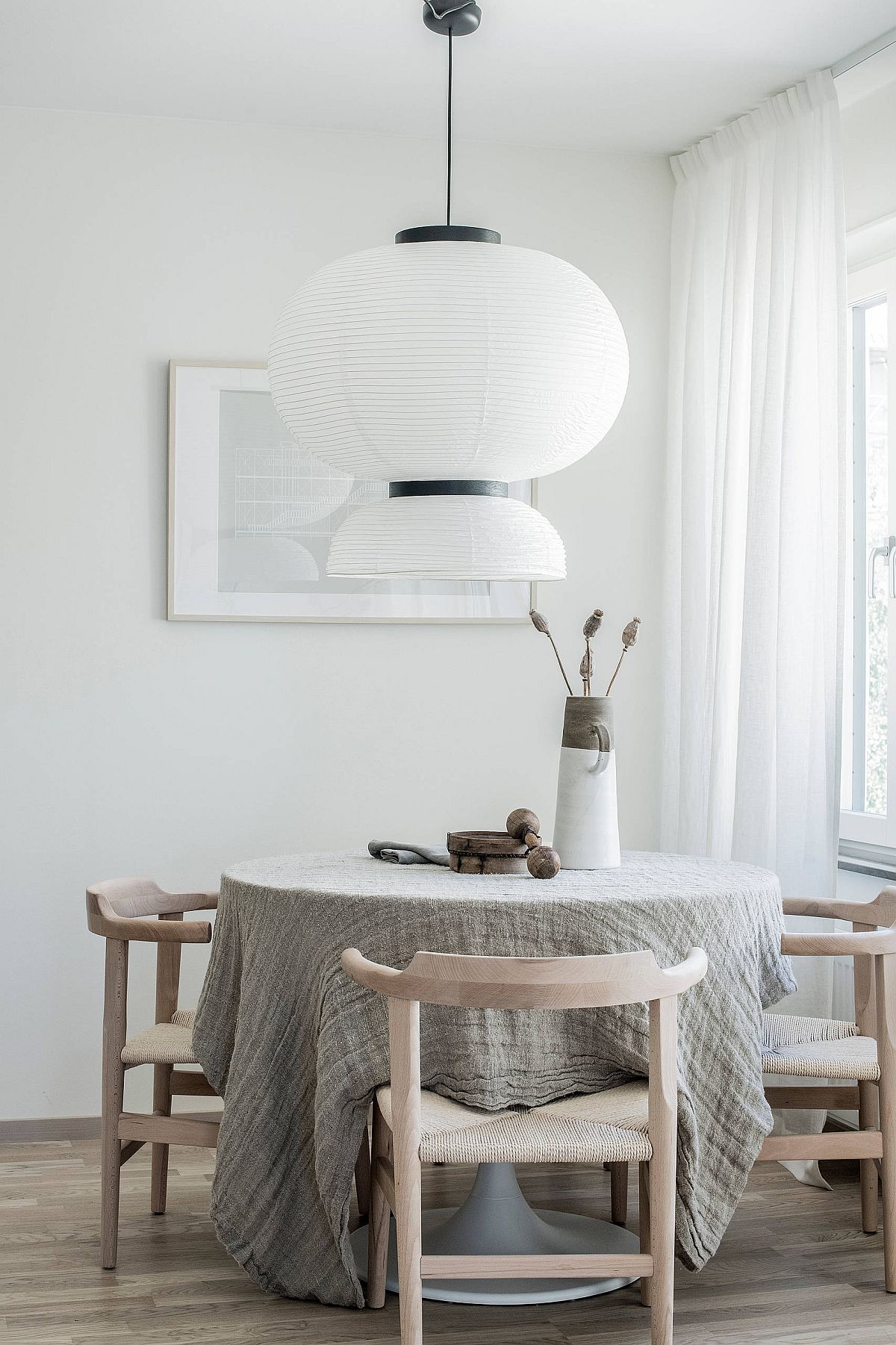 Oversized pendant for the tiny dining area in white