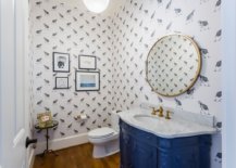 Powder-room-with-wallpaper-that-adds-fun-motifs-and-a-blue-vanity-with-a-dash-of-pattern-95557-217x155