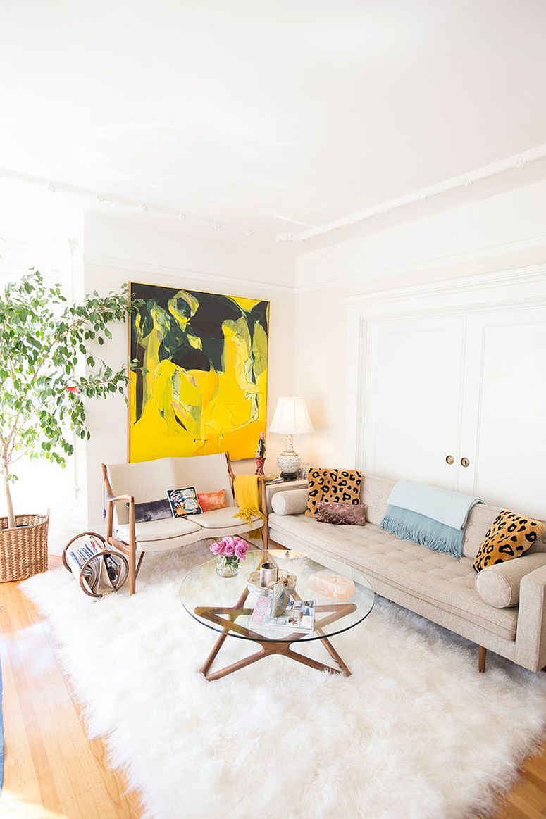 Shabby chic accents coupled with a bright pop of yellow in the cozy white living room