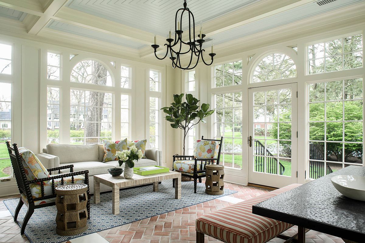 Terracotta-tiled-flooring-is-perfect-for-the-light-filled-living-room-in-white-19982