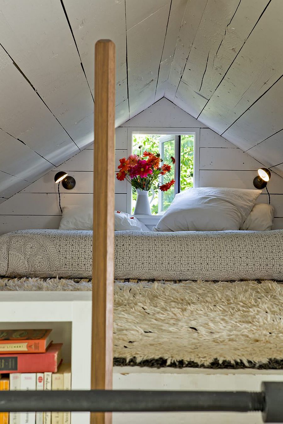 Tiny shabby chic loft bedroom inside the small home is a necessity rather than a luxury!