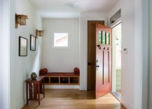 Unassuming-entry-room-in-white-with-functional-wooden-decor-that-offers-storage-space-27725-217x155