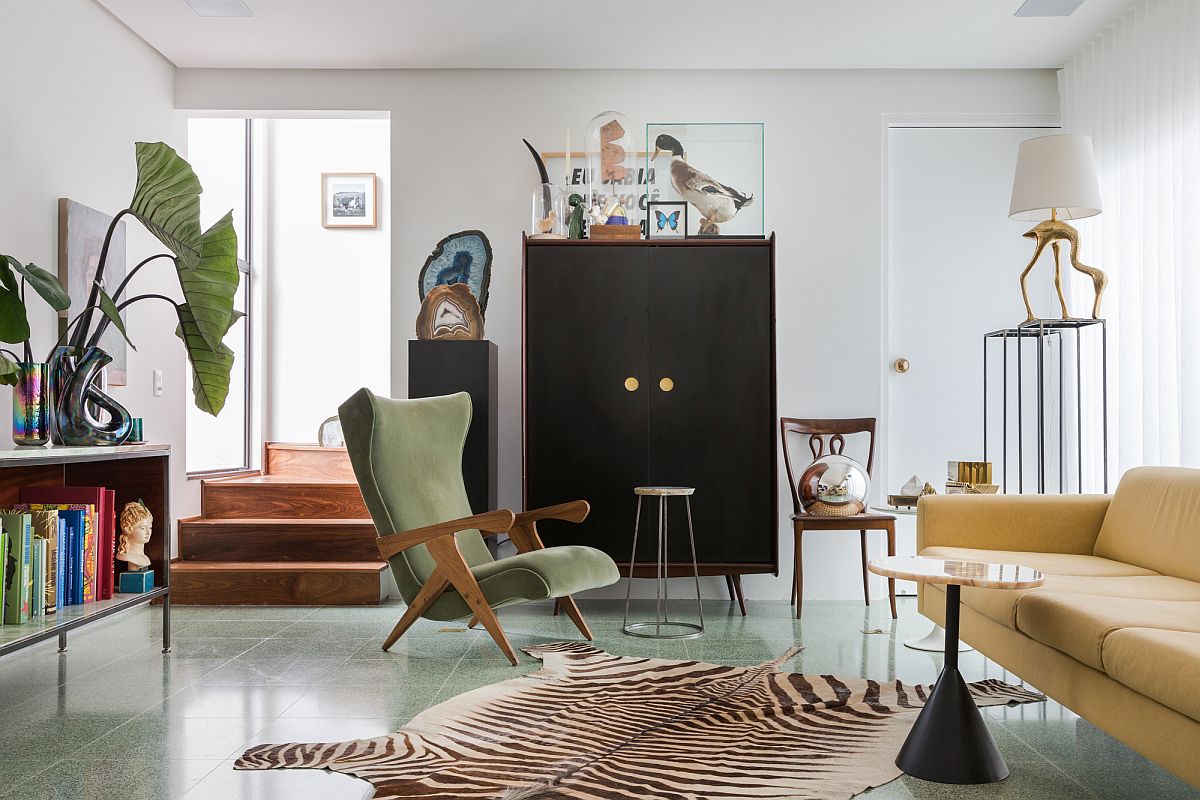 Vintage and rare furniture pieces collected across eras gives this home a modern minimal style draped in timeless appeal