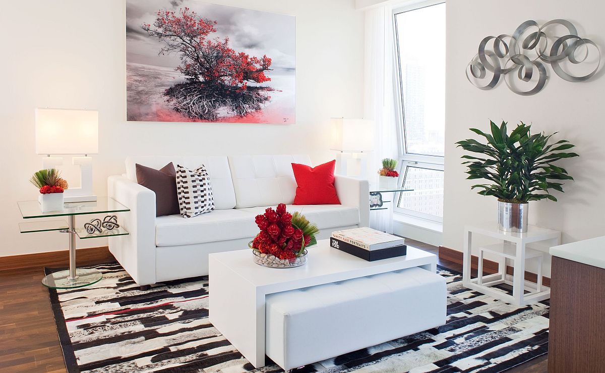 Wall art is an easy way to add a hint of color to the small white living room