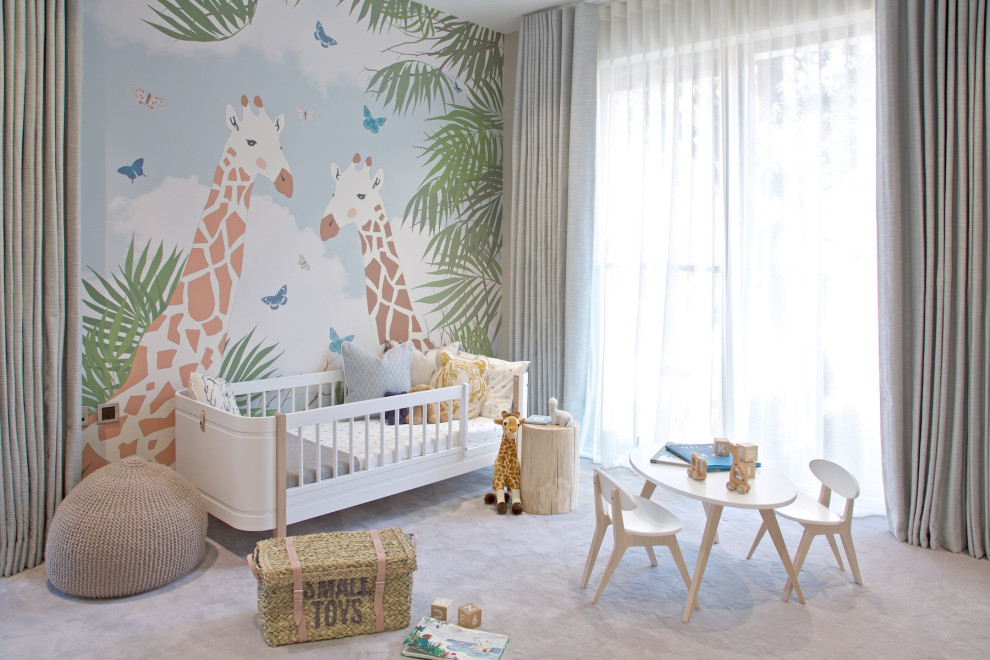 Wallpaper brings a hint of tropical charm to the modern nursery with ample natural light