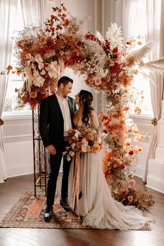Wedding arch with fall florals