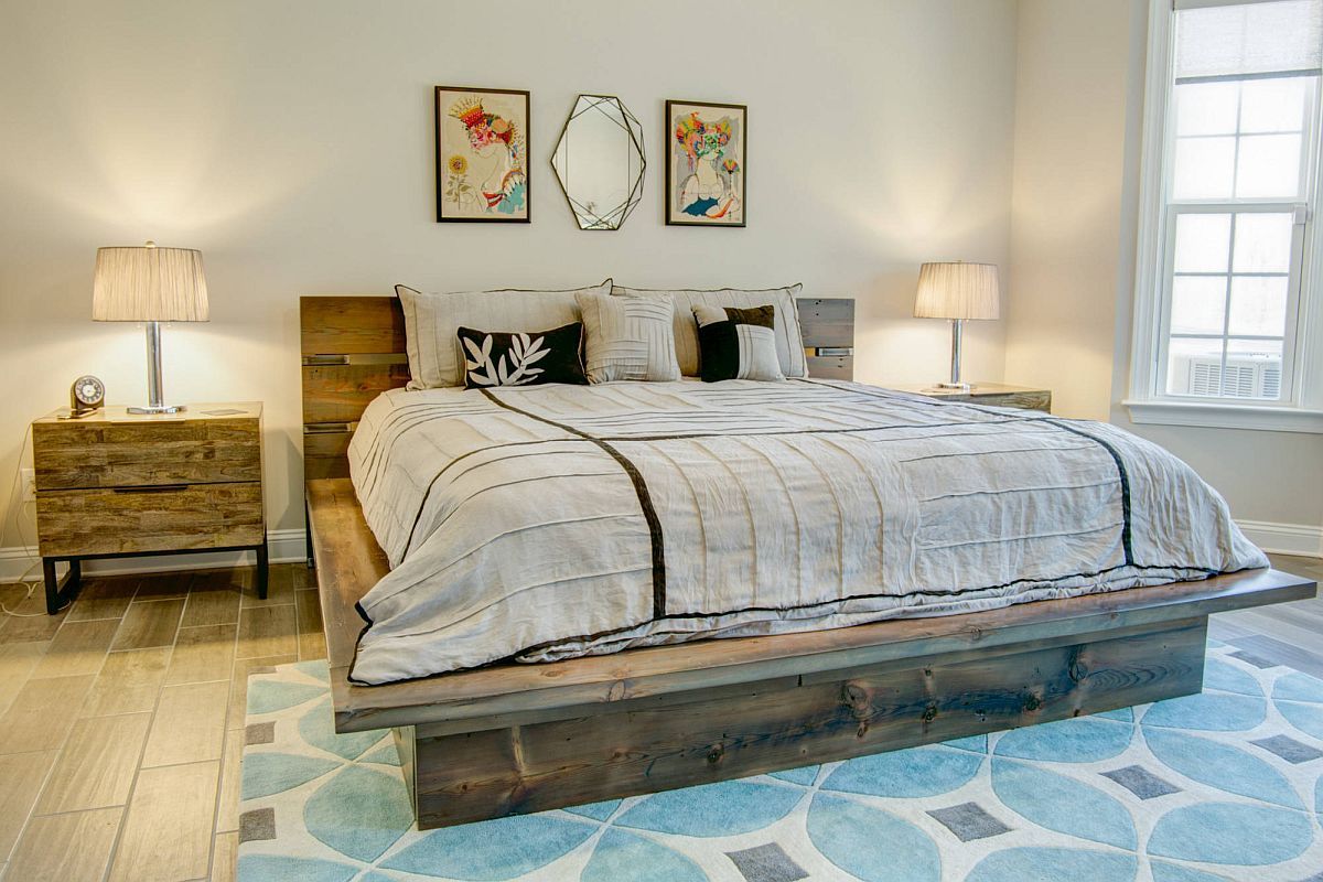 Woodsy-platform-bed-for-the-large-master-bedroom-with-amtching-nightstand-next-to-it-75476