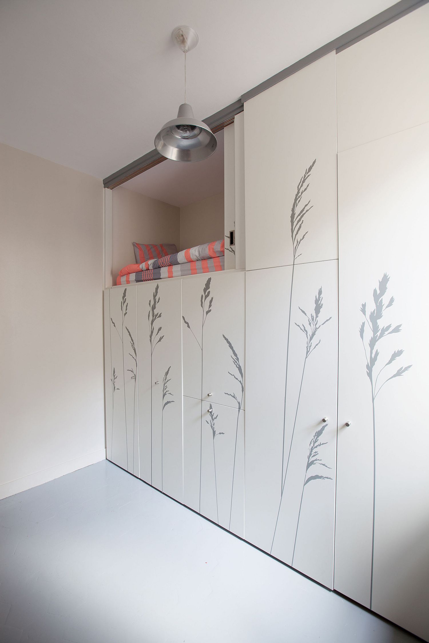 Beautiful custom wall inside the small maid&#039;s apartment combines aesthetics with ergonomics