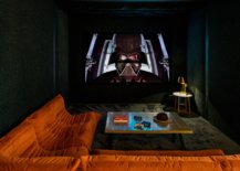 Black-home-theater-in-London-with-bright-Togo-Sofa-and-a-projector-55685-217x155