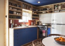 Blue-cabinets-in-the-kitchen-add-to-the-colorful-appeal-of-the-trailer-home-with-a-striking-blue-ceiling-30221-217x155