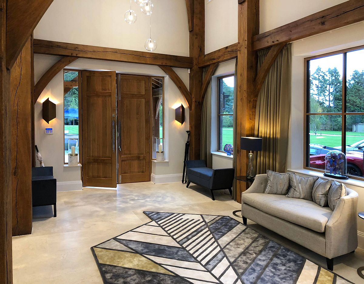 Brilliant blend of timber and geometric pattern inside the spacious entry of London home