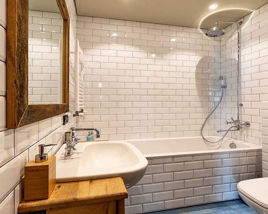 Classic bathroom with subway tiles in white and wooden accents