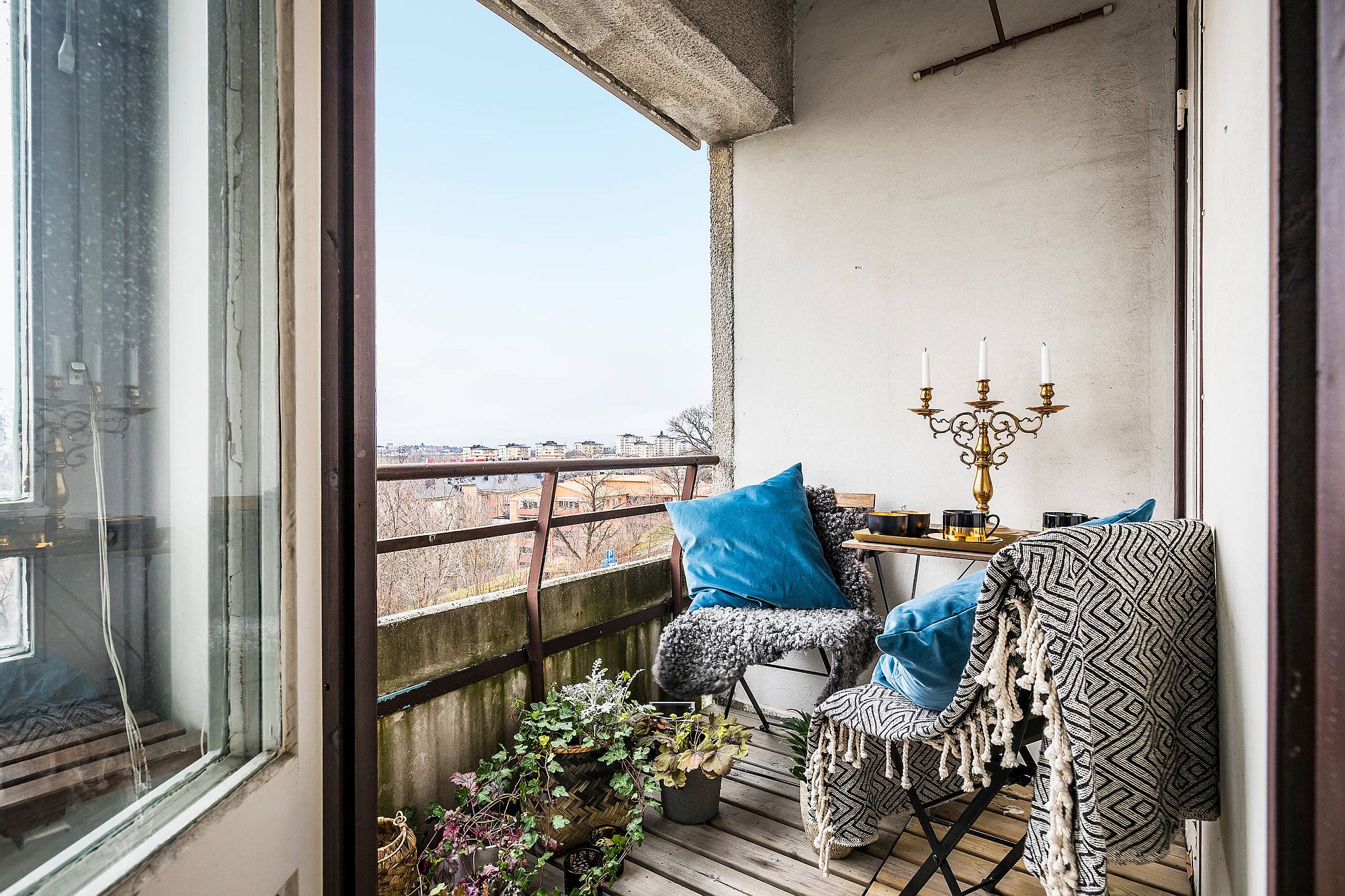 Classy eclectic approach to decorating the small balcony for a special lunch!