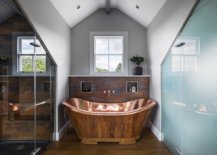 Copper-and-oak-roll-top-bathtub-inside-the-master-suite-with-multiple-finishes-44270-217x155