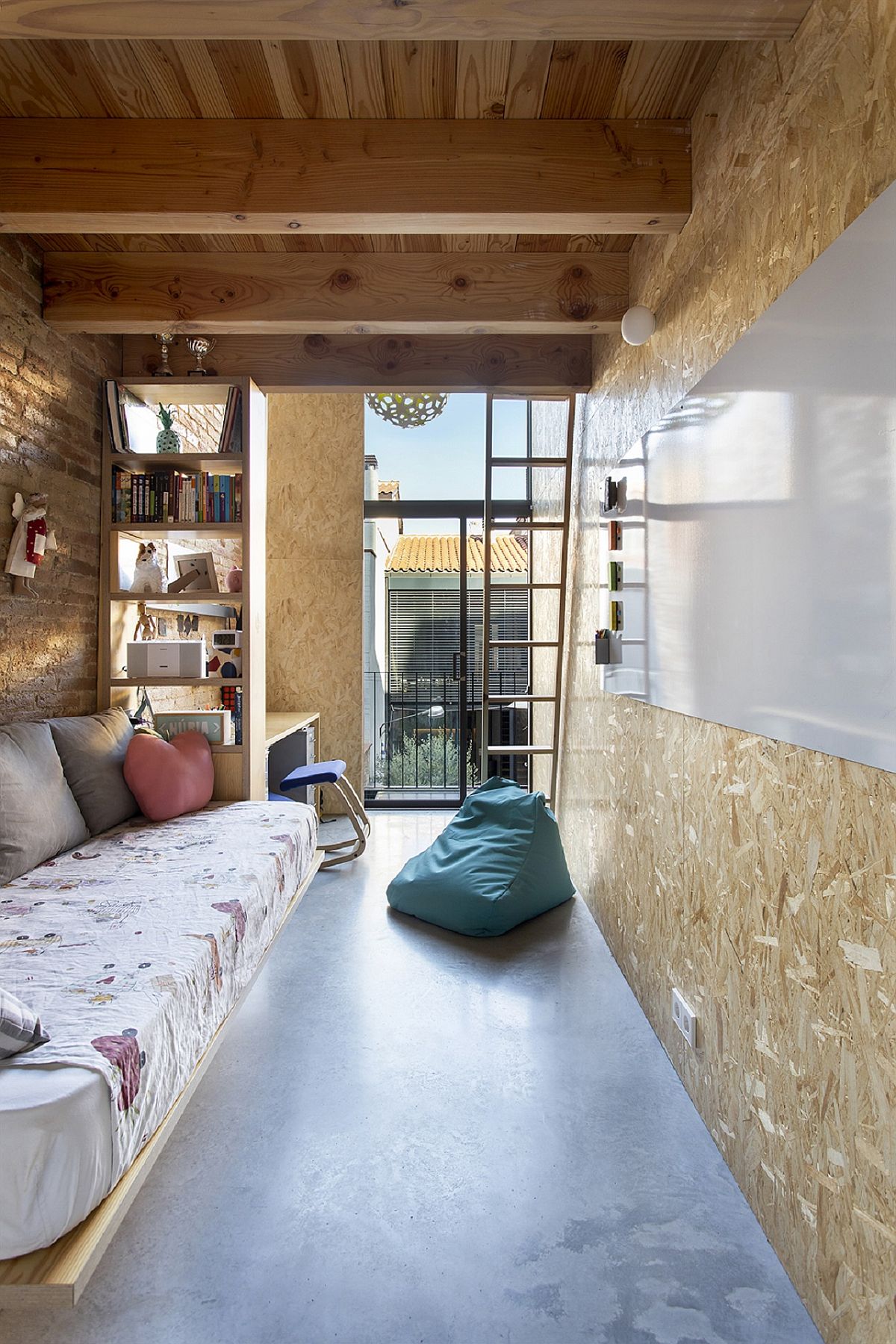 Cork-covered walls give the home a quirky surface that is as beautiful as brick and wood walls