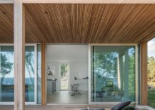 Custom-larch-panelling-gives-the-cozy-summer-house-a-warm-and-welcoming-look-72585-217x155