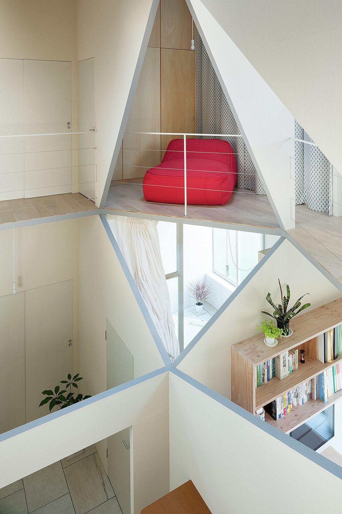 Different-cut-outs-and-spaces-create-tiny-rooms-inside-the-house-with-geometric-style-94238