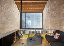 Faulous-reading-and-family-room-with-comfy-seating-brick-walls-and-wooden-ceiling-74979-217x155
