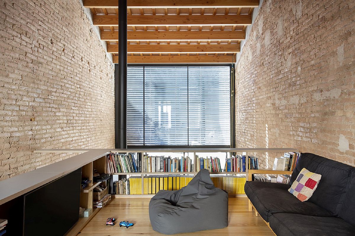 Faulous-reading-and-family-room-with-comfy-seating-brick-walls-and-wooden-ceiling-74979
