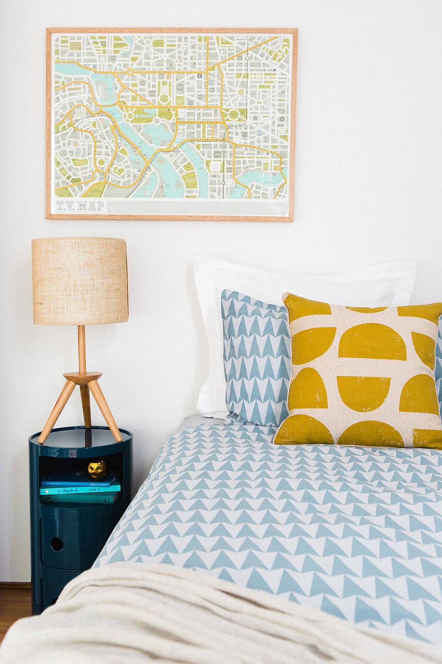 Framed maps are an easy way to add both color and pattern to the bedroom