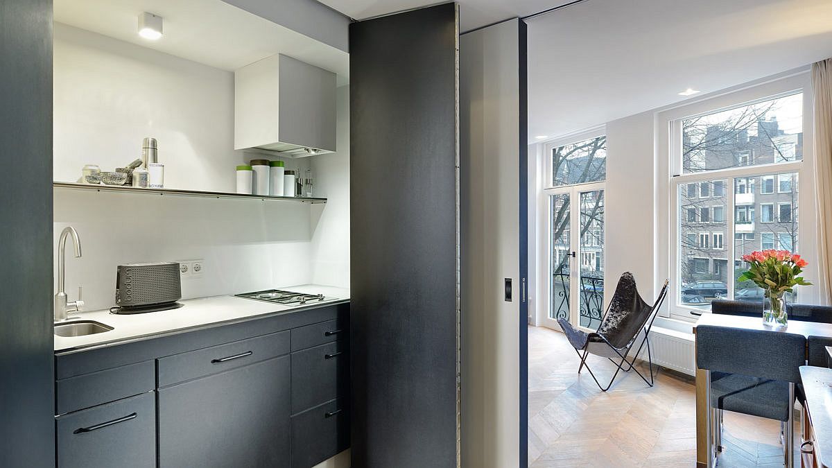 Gray, white and wood used to renovated aging Amsterdam home