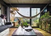Hammock-brings-breezy-bohemian-appeal-to-the-unique-London-apartment-living-room-20333-217x155
