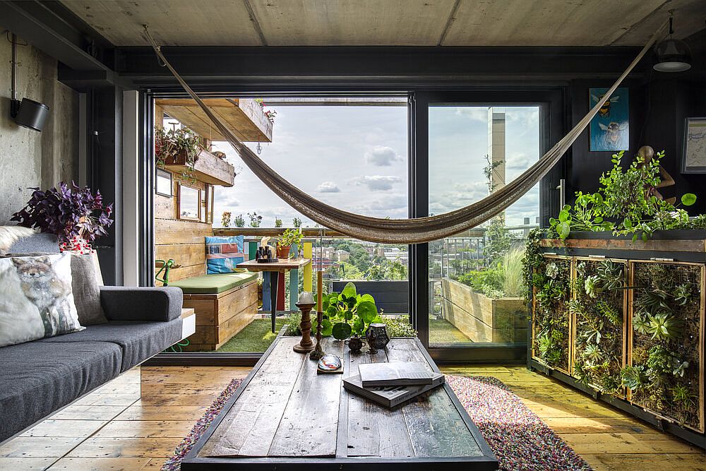 Hammock-brings-breezy-bohemian-appeal-to-the-unique-London-apartment-living-room-20333