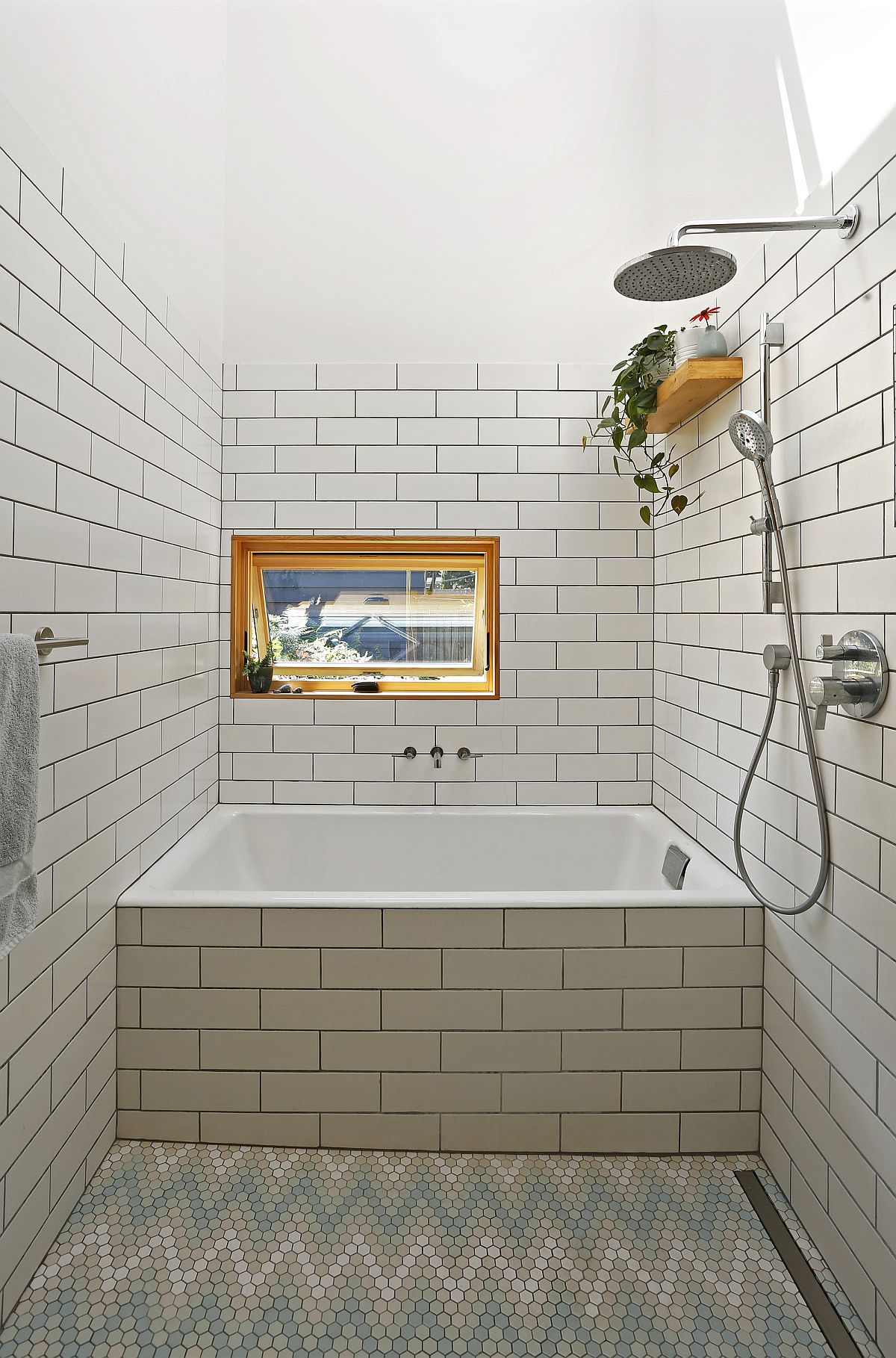 Interesting use of chevron pattern tile for the bathroom floor