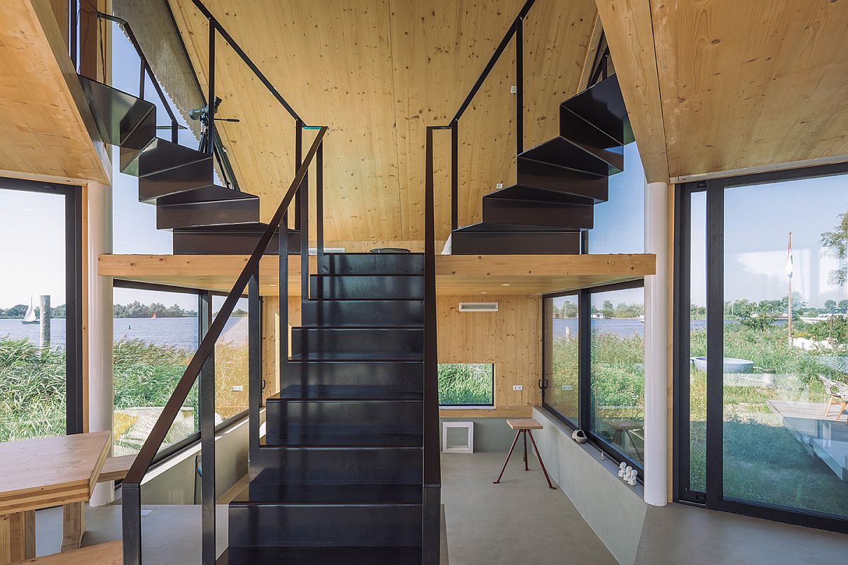 Interior of the Caseta House in wood, glass and hint of darkness