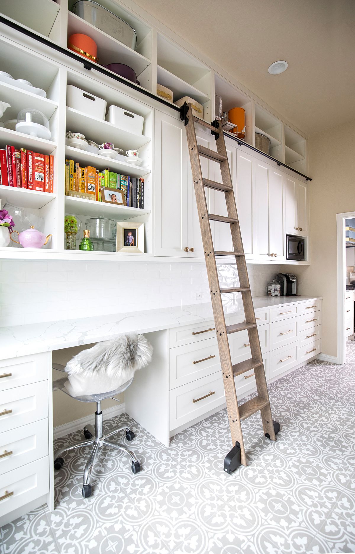 Kitchen offers ample space to create a home workstation by pulling up a chair