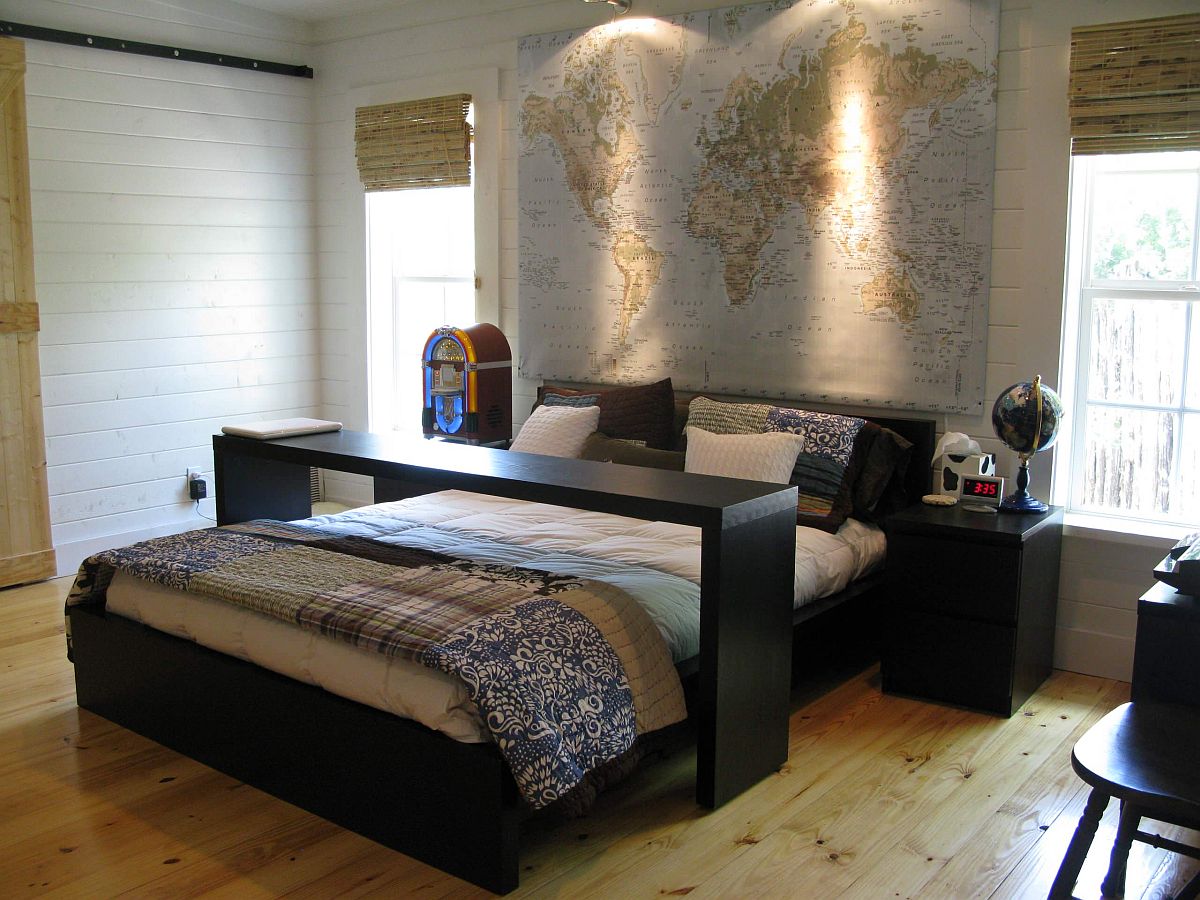 Lighting makes all the difference as it highlights the map in this modern bedroom