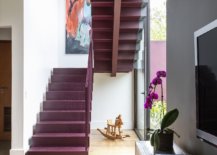 Metallic-staircase-in-bright-red-brings-color-and-contrast-to-the-modern-interior-96415-217x155