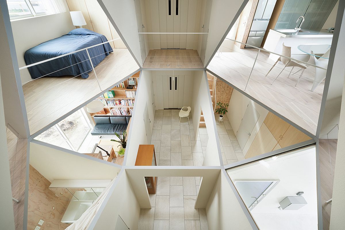 Geometric Masterpiece: Hexagonal Atrium Enlivens Modern Home with 12 Rooms