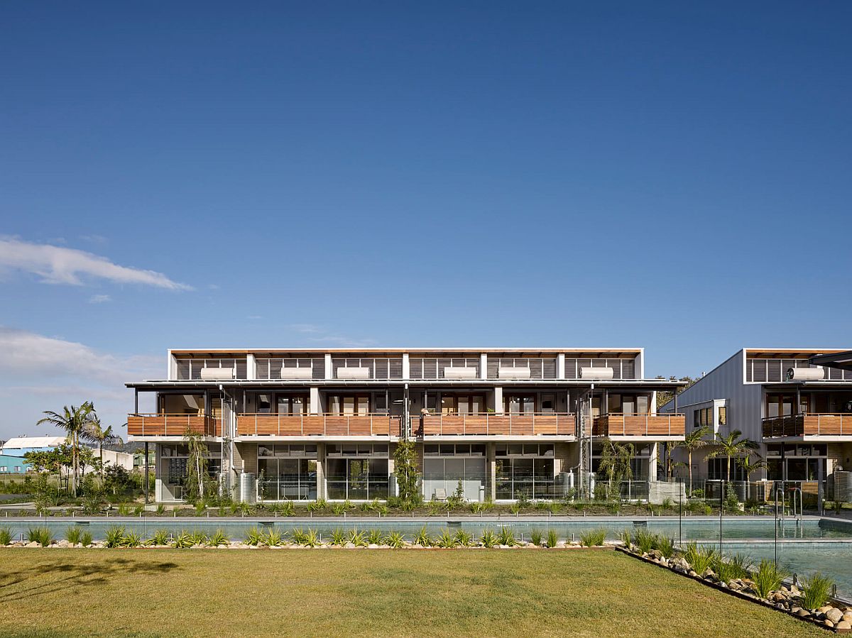 Multiple live work units of the Habitat project with green landscape all around