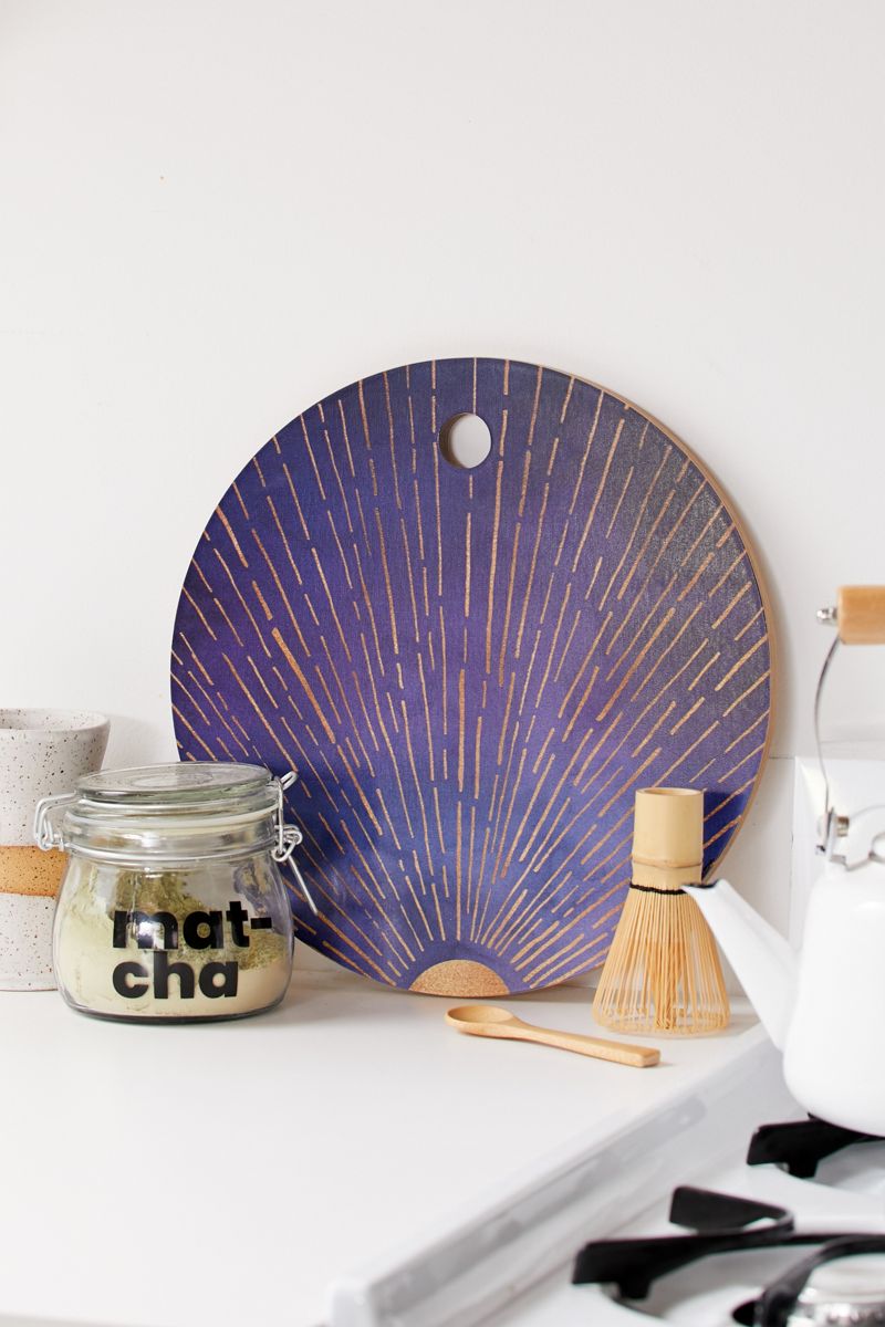 Round indigo cutting board with gold detailing