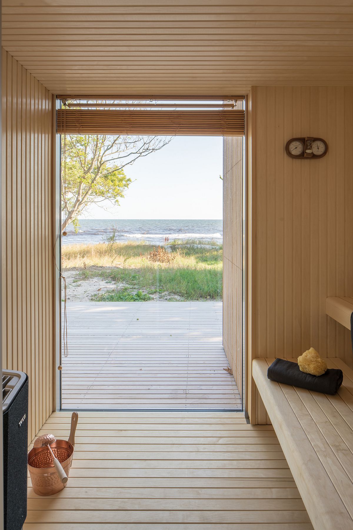 Sauna room of the summer house offers view of the beach and the Baltic Sea