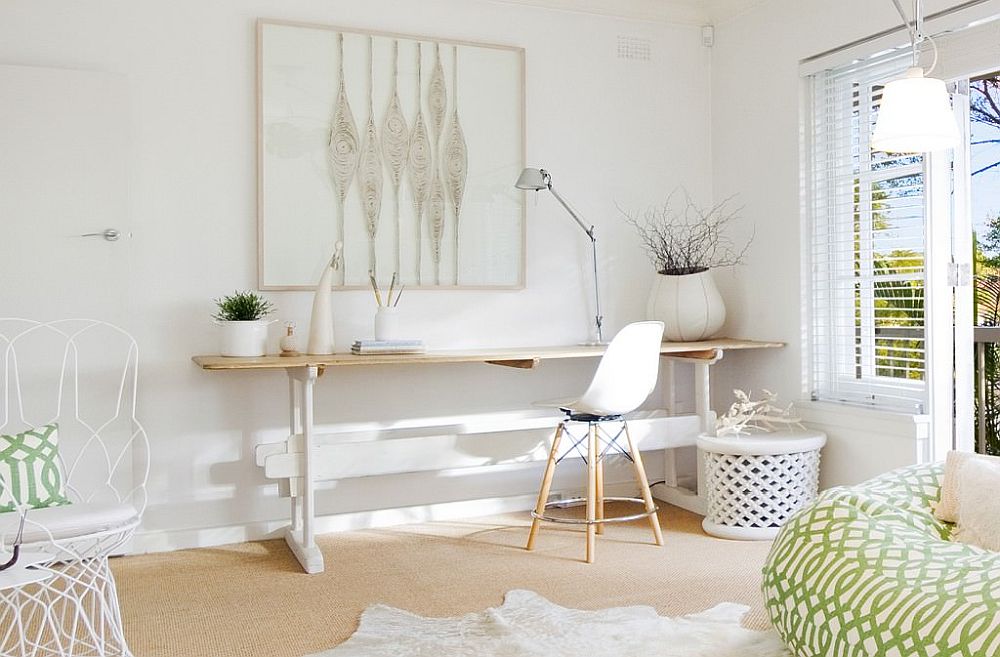 Simple-and-sleek-desk-coupled-with-a-comfortable-chair-in-white-for-a-stylish-home-workspace-95266