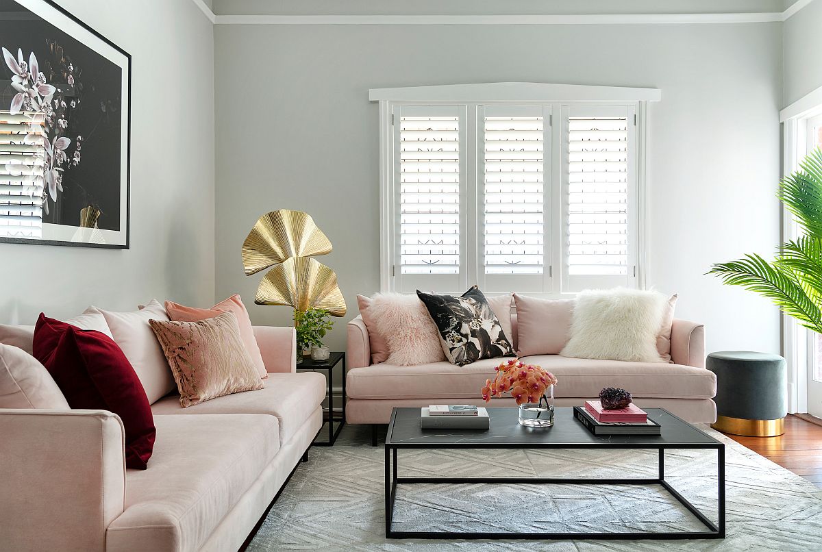 Single accent pillow in scarlet brings colorful charm to this lovely living room