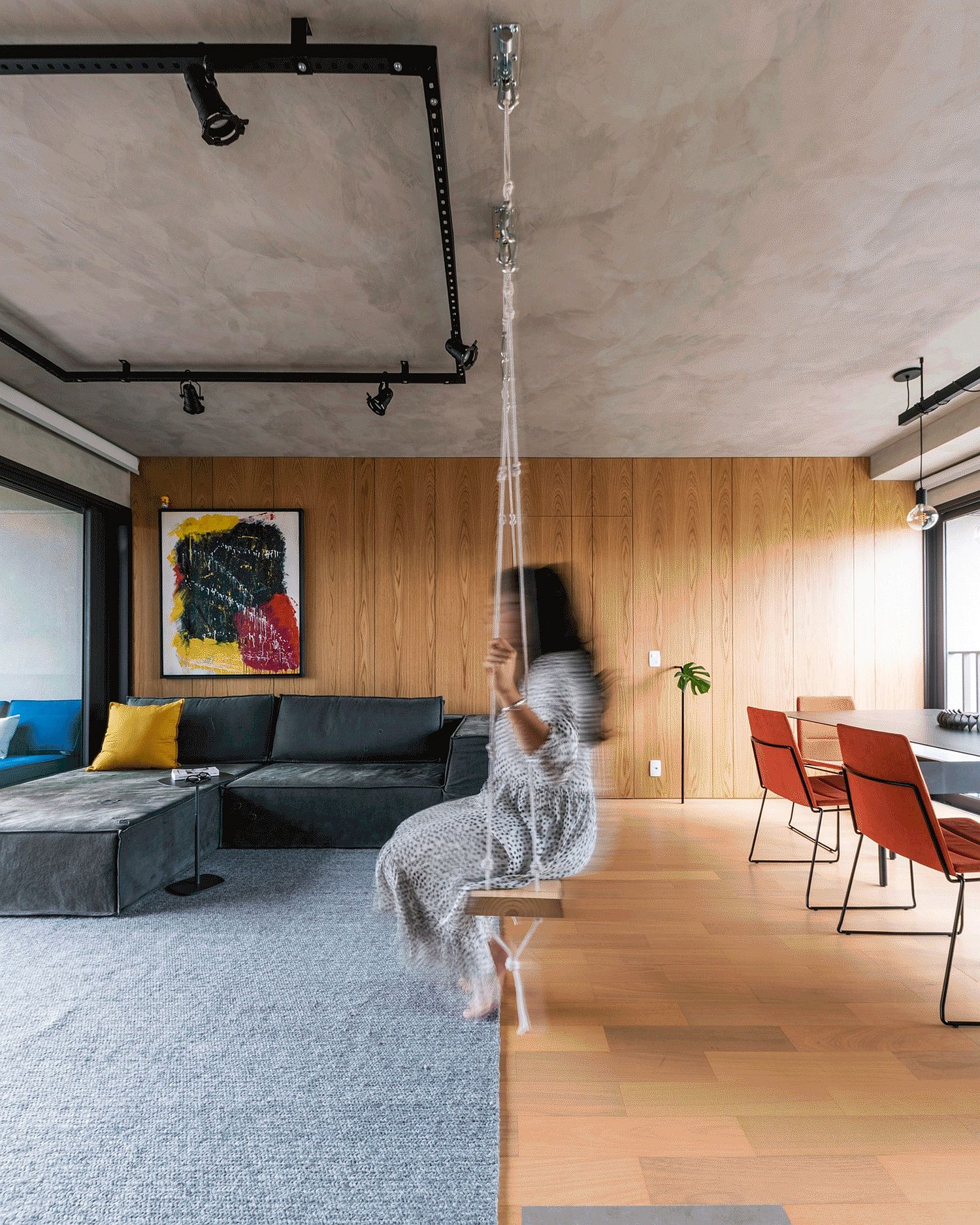 Swing in the living area keeps things cheerful and moving!