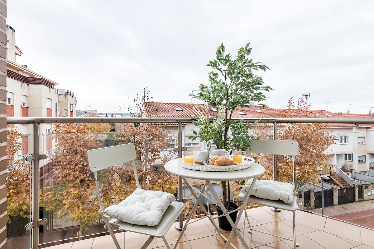 Small balcony with Scandinavian style can host everything from beautiful breakfasts to romantic dinners