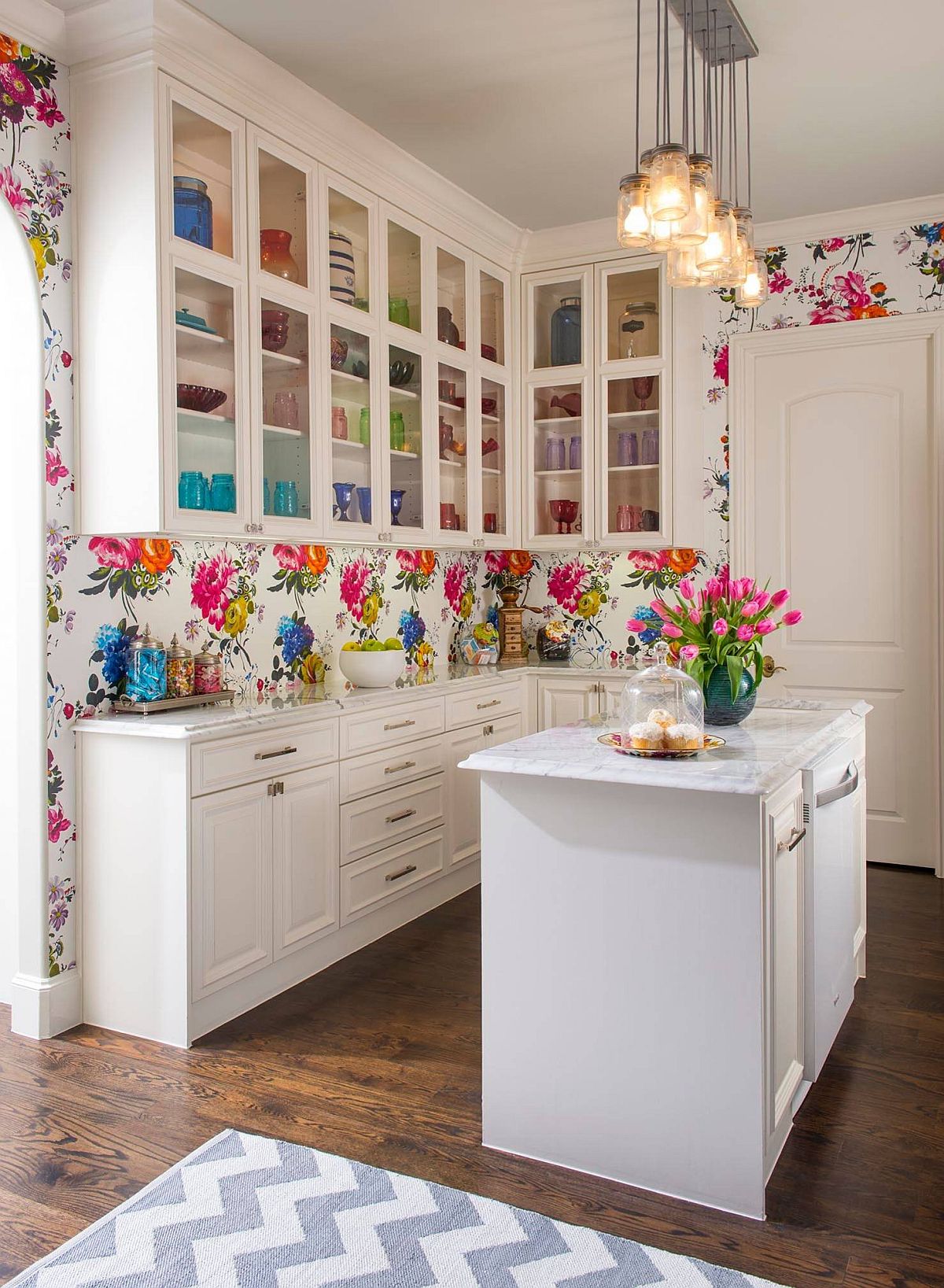 Small kitchen where colorful flowers take over with class!