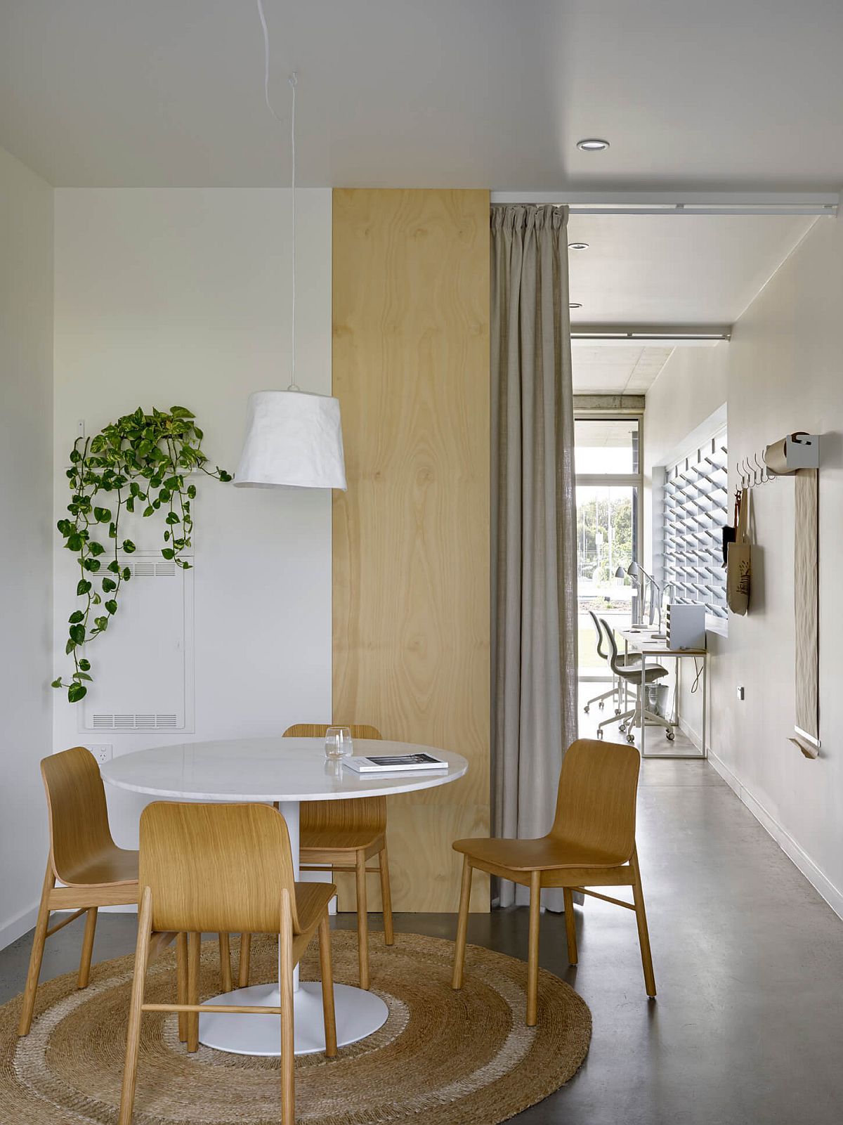 Small white and wood dining area idea with modern style