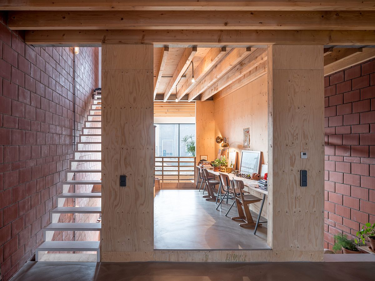 Smartly designed wooden core of the house with home workspace