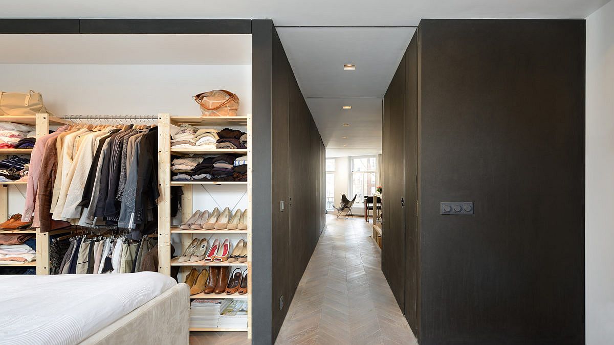 Spacious closet inside the modern minimal master bedroom