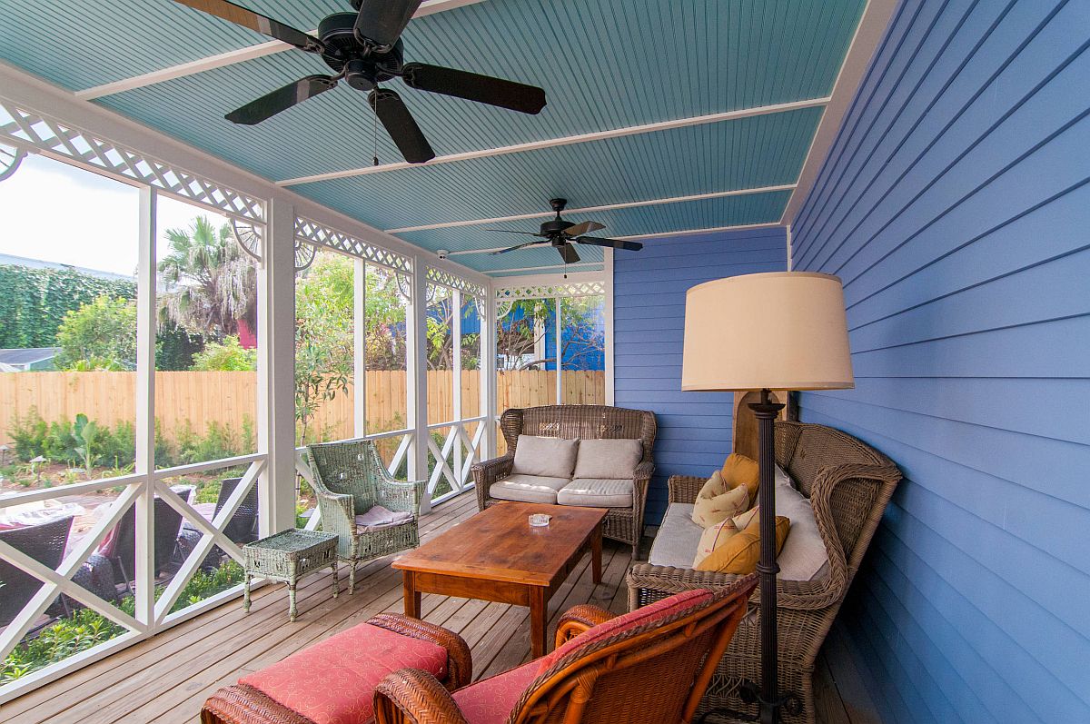 Spacious eclectic porch in blue is one where color is always welcome!