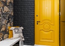 Striking-yellow-door-makes-the-grandest-visual-statement-in-this-dark-and-dashing-contemporary-entry-98983-217x155