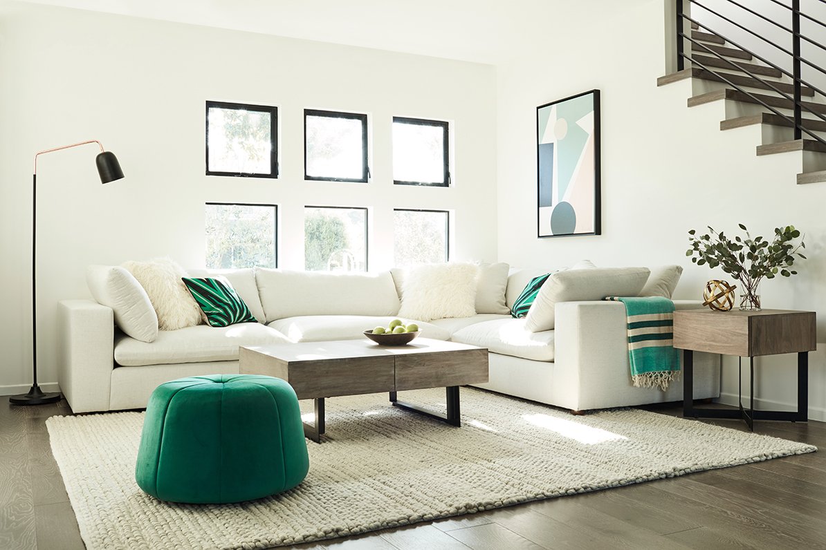 Teal ottoman and accents