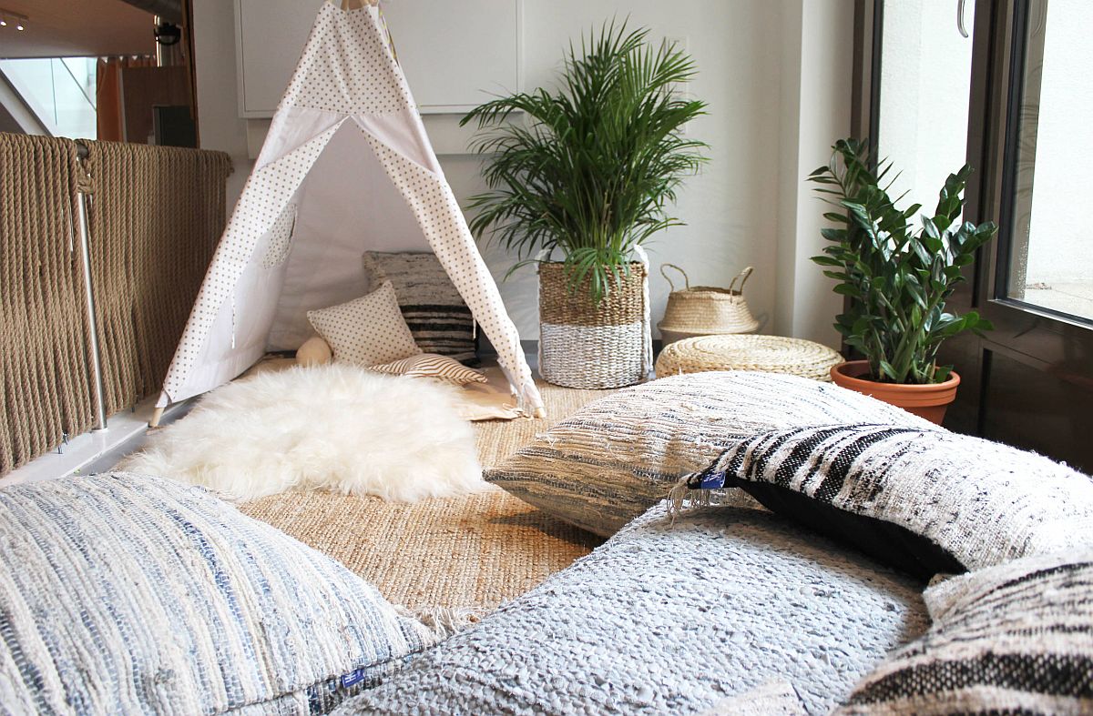 Teepee, floor cushions and a plush rug can transform any place into a kids' playroom