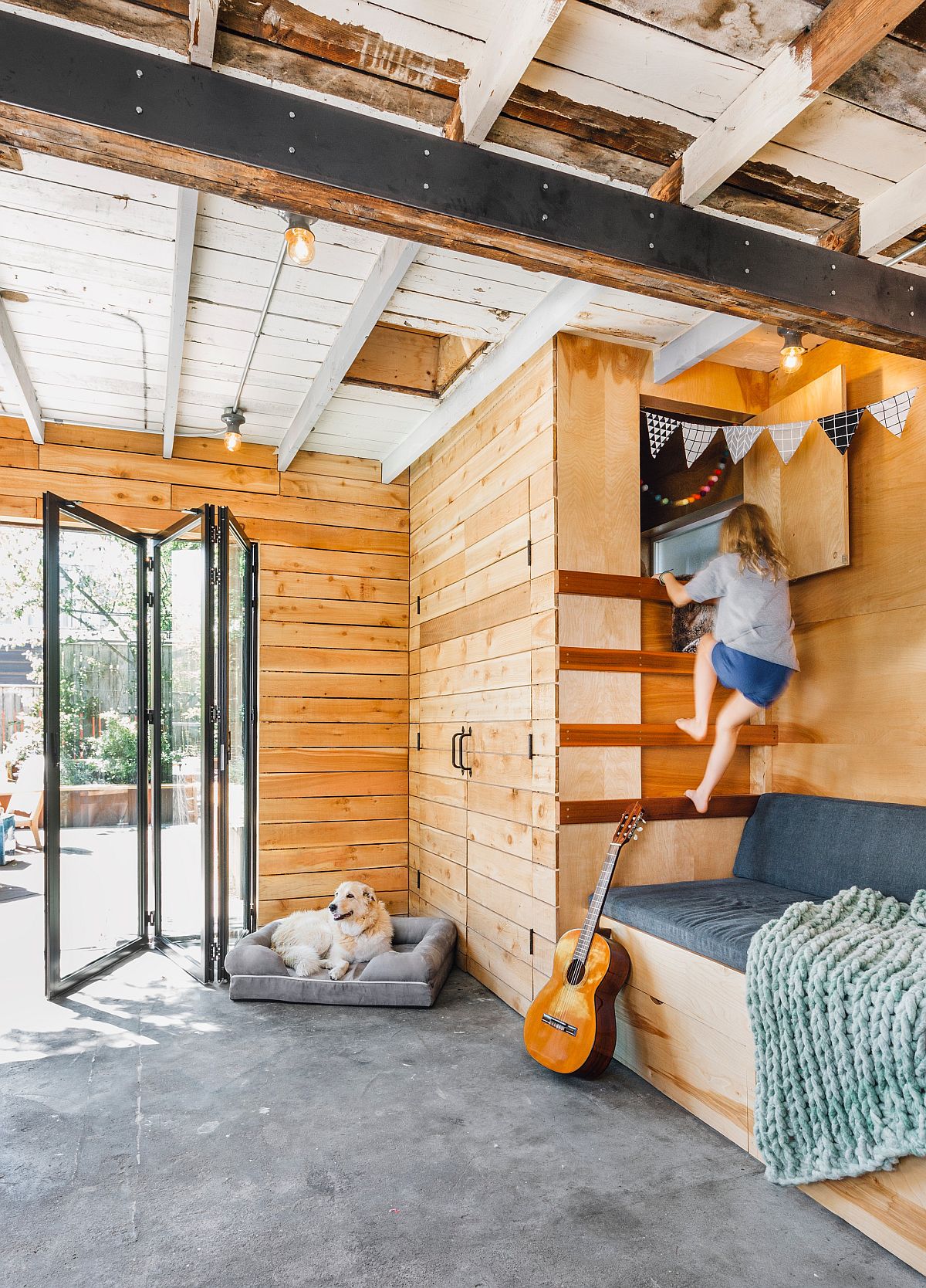 Think of vertical space to create custom and cozy play zones that give kids privacy they need!