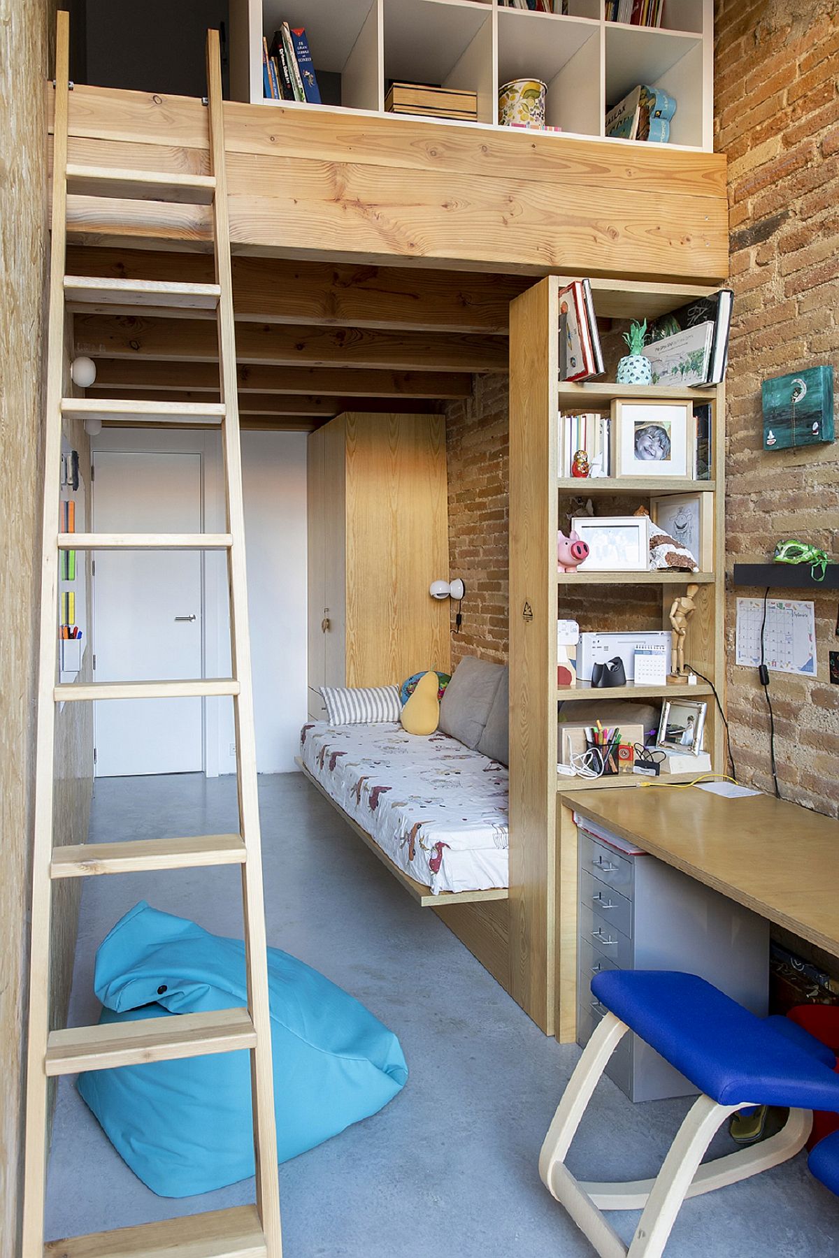 Tiny bedroom with loft level makes smart use of limited space